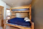 Bunk room that is great for children with a twin-over-full and additional twin trundle